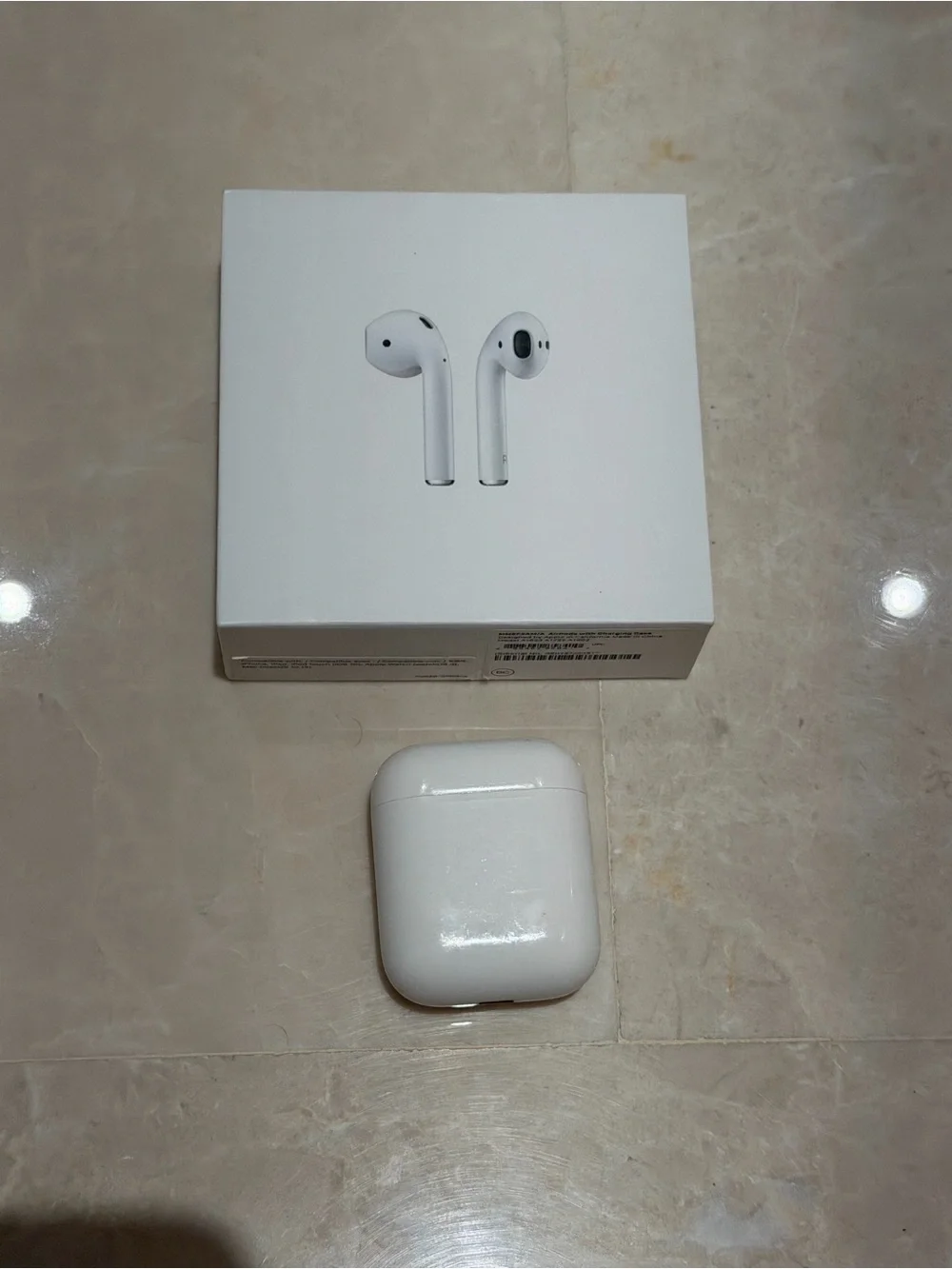 Apple AirPods Wireless Earbuds with Charging Case